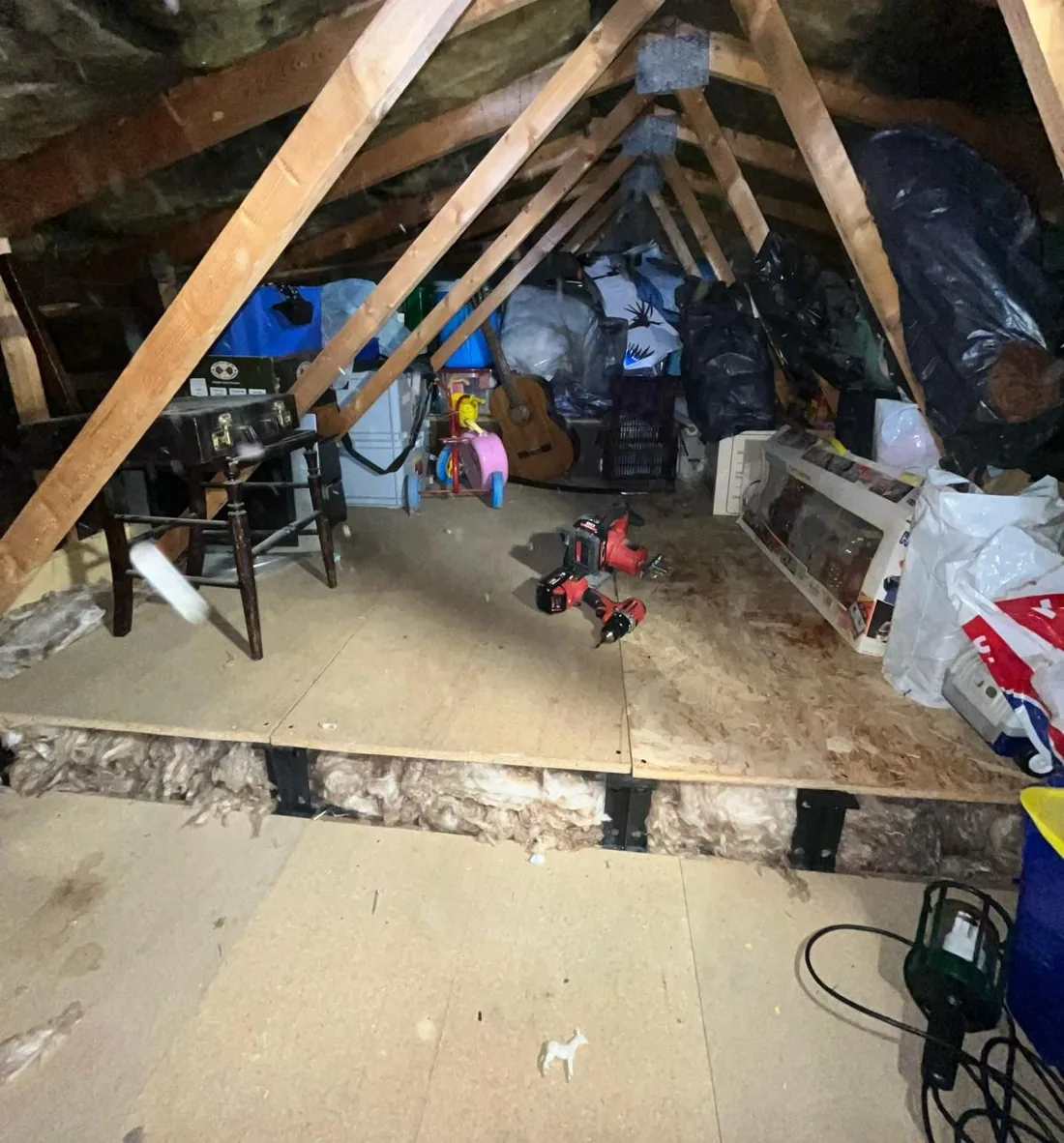 The finished boarded storage area in the Leeds loft, back in use